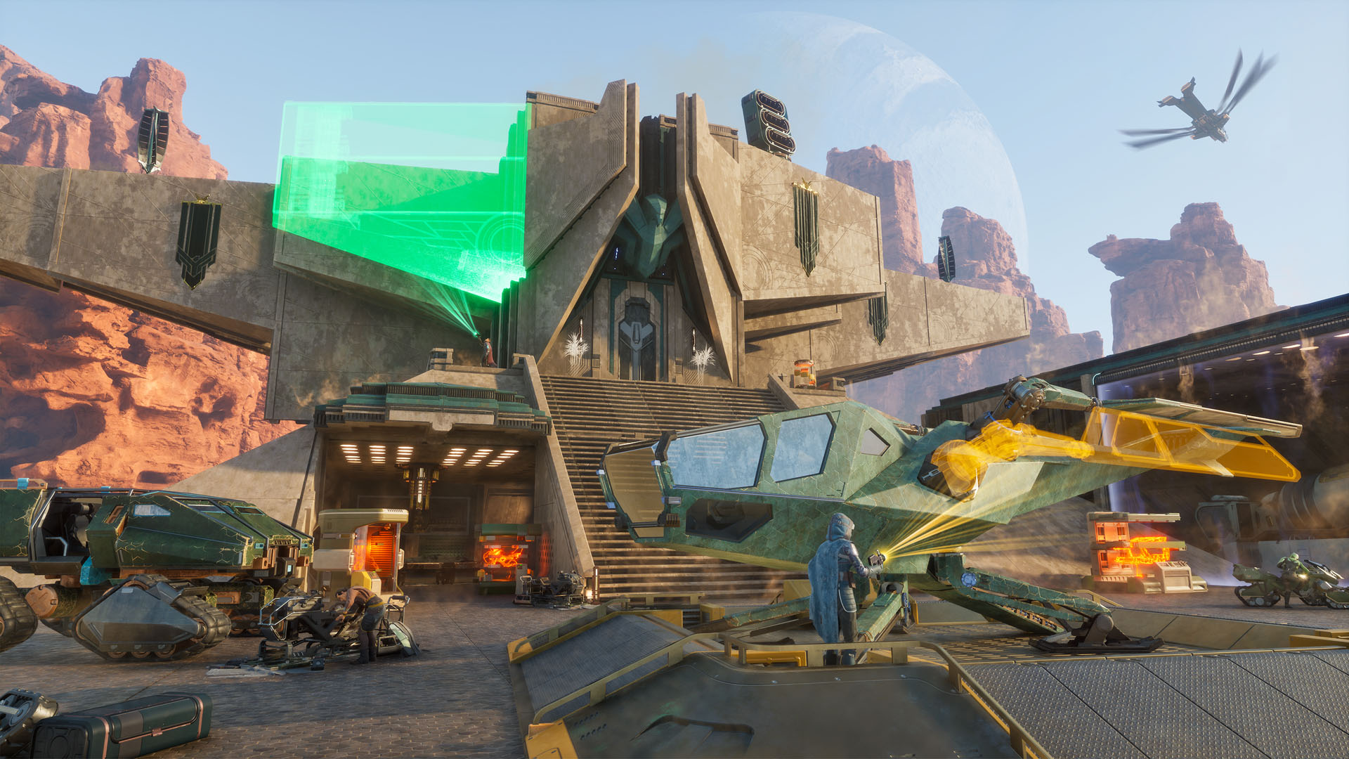 Player-built base with an ornithopter and ground vehicles at a desert settlement on Arrakis